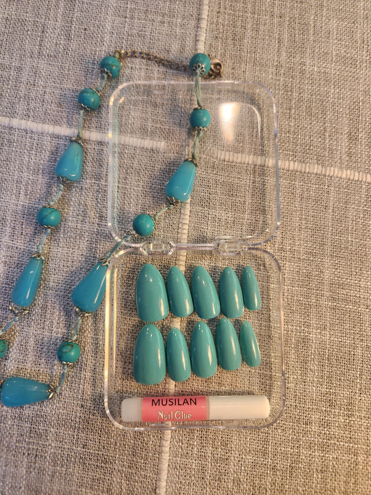 Teal nails with matching teal necklace