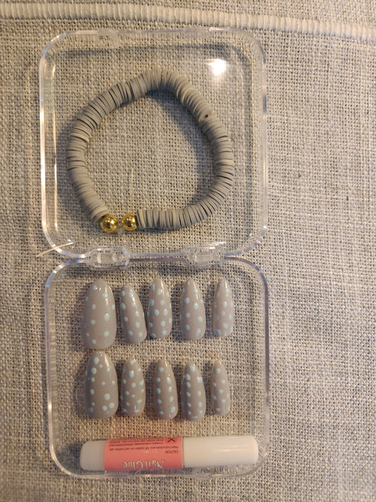 Gray nail set with blue polka dots and matching gray clay bracelet